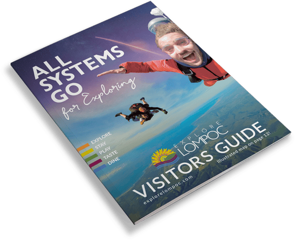 A thrilling skydiving experience over Lompoc California with vibrant skies and scenic views.