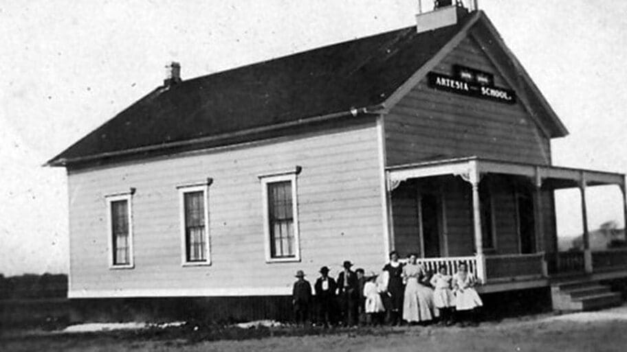 Black-and-white photo of the Artesia Schoolhouse, built in 1876