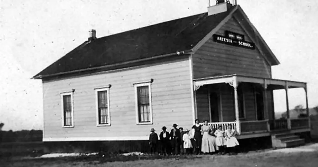 Black-and-white photo of the Artesia Schoolhouse, built in 1876