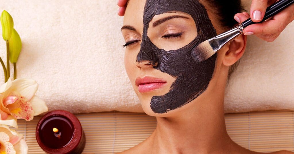 Woman getting a facial in a spa