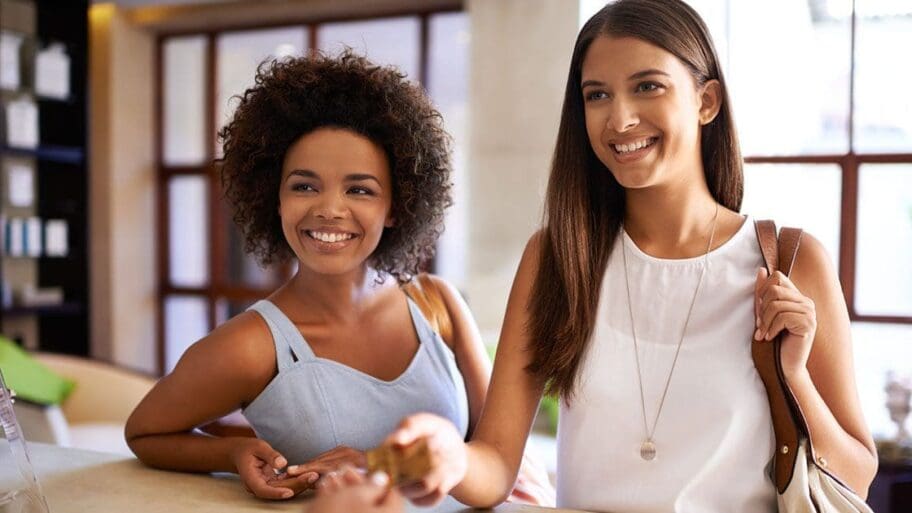 Women checking in to salon and spa appointment