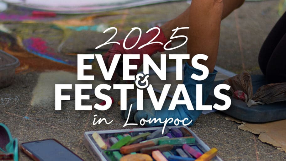 Chalk pastels and a smartphone lie on the ground, highlighting 2025 Events & Festivals in Lompoc, capturing the vibrant spirit of this charming town.