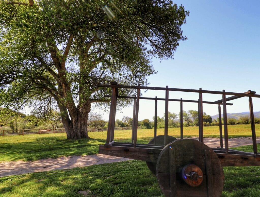 Photo of an old cart on the grounds of La Purisima Mission